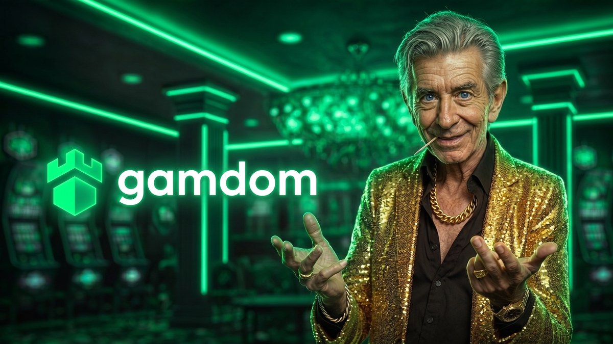 Chip, the ChipReign host in his gold sequin blazer, in a Gamdom lobby with the green Gamdom logo on a dark wall